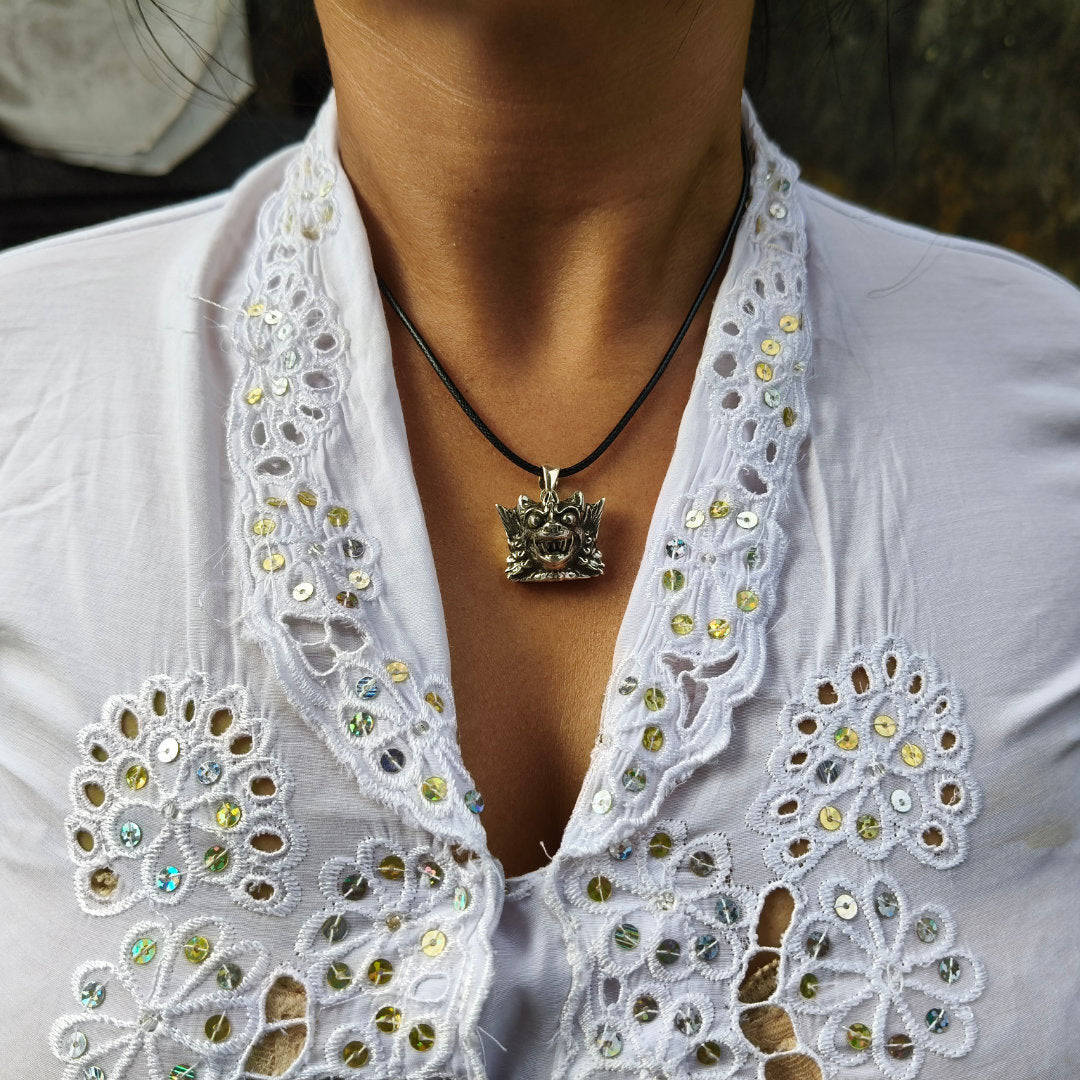 Lion pendant worn in Bali